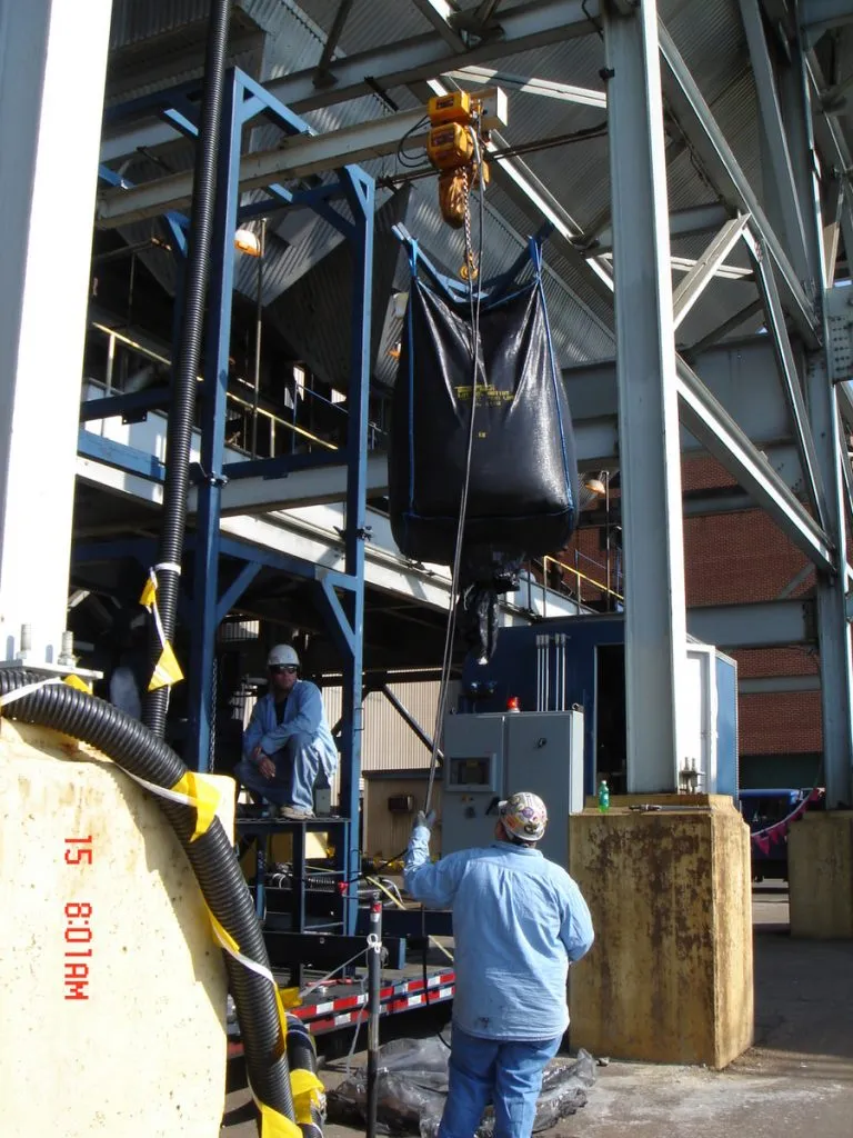 IAC's Dry Sorbent Injection System test trailer with bulk bag unloader for regent feed