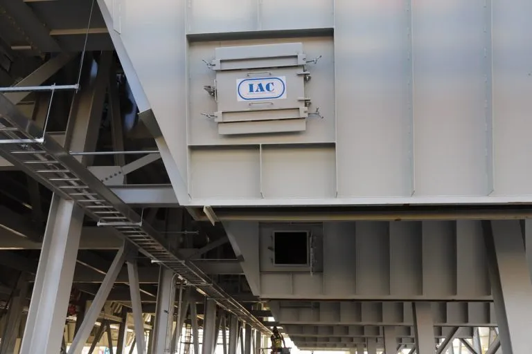 Access inspection doors on the bottom of baghouse dust collectors